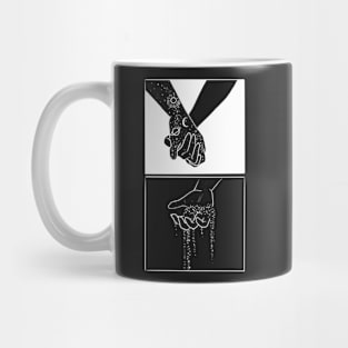 Hands holding, letting go Mug